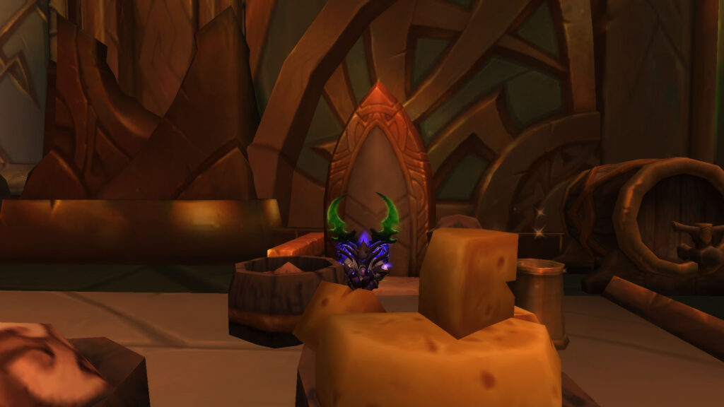 WoW the night elf is sitting at a very huge table